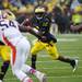 Michigan senior quarterback Denard Robinson looks to throw in the second half of the game against Illinois on Saturday. Michigan won 45-0. Daniel Brenner I AnnArbor.com